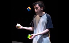 Solving Three Cubes Whilst Juggling